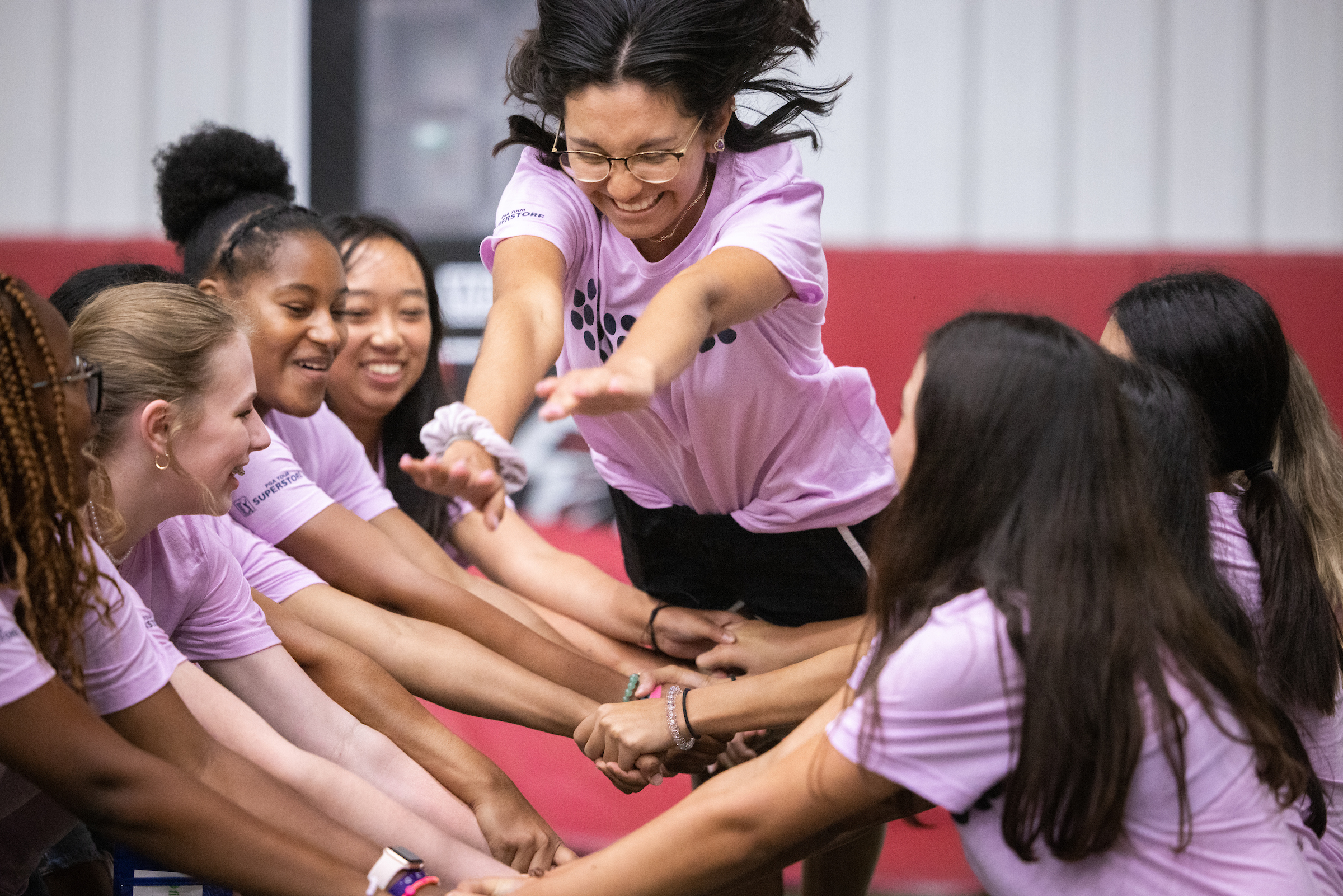 Group of First Tee participants participating in a team-building activity