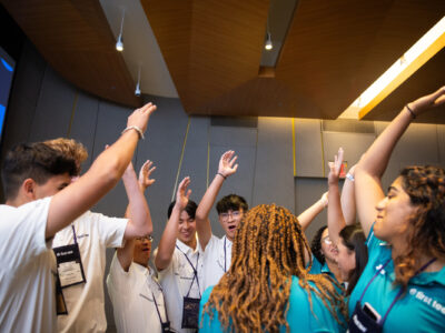 Group of First Tee participants cheering