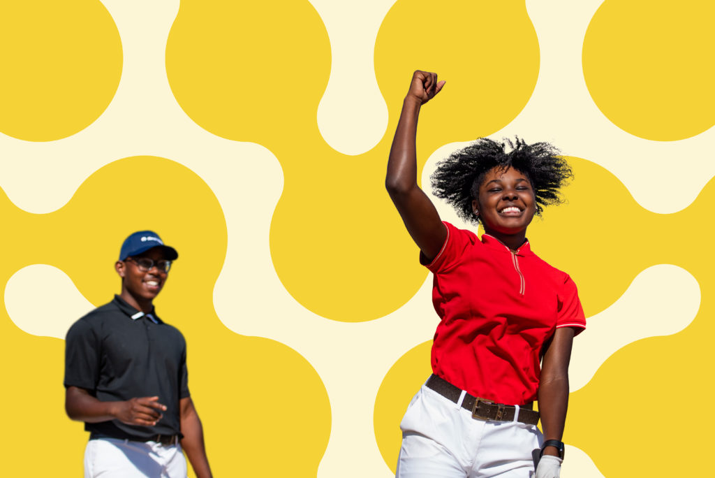 First Tee participant celebrating.