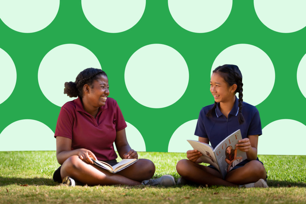 First Tee participants reading.